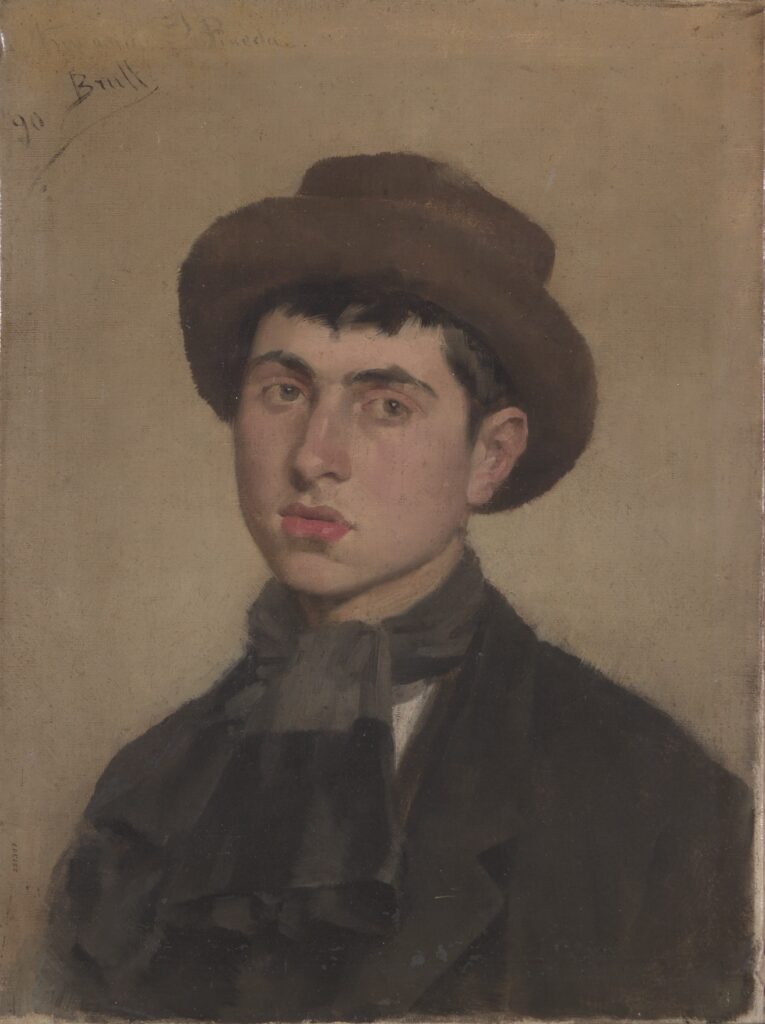 Oli amb el retrat d'un jove de cabells foscos i barret marró, vestit de negre, datat el 1890