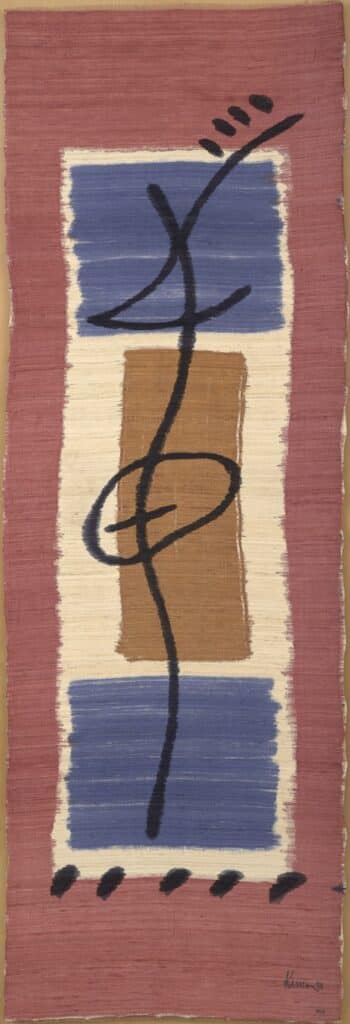 Tela teixida amb dibuixos geomètrics, amb un fons vermellosos i sobreposats, diversos requadrse de tons blanc, blau i ocre, amb línies que recorden a la grafia japonesa